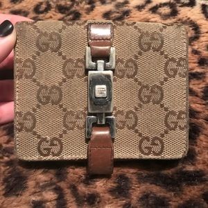 Gucci bi fold wallet.